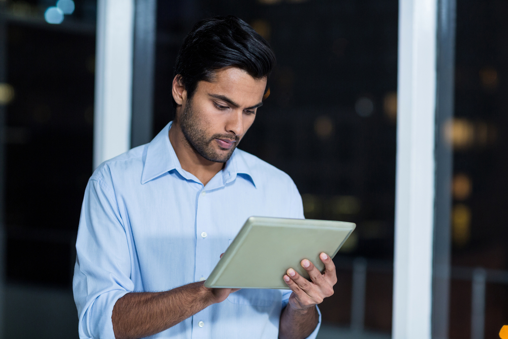Businessman using digital tablet in the office